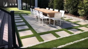 image of SYNLawn West Palm Beach FL residential backyard dining artificial grass paver design
